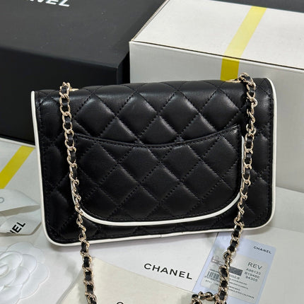 QUILTED FLAP BAG WITH WHITE TRIM 19 IN BLACK LAMBSKIN