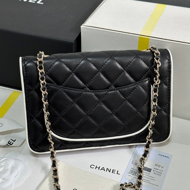 QUILTED FLAP BAG WITH WHITE TRIM 19 IN BLACK LAMBSKIN