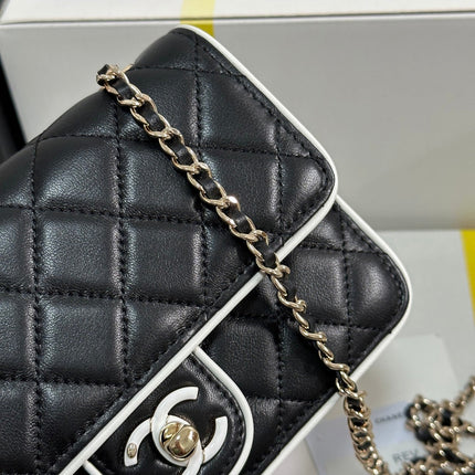 QUILTED FLAP BAG WITH WHITE TRIM 19 IN BLACK LAMBSKIN
