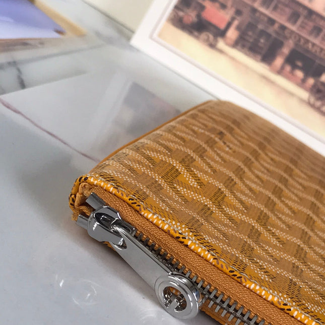 SÉNAT MGM POUCH 40 IN YELLOW GOYARDINE CANVAS