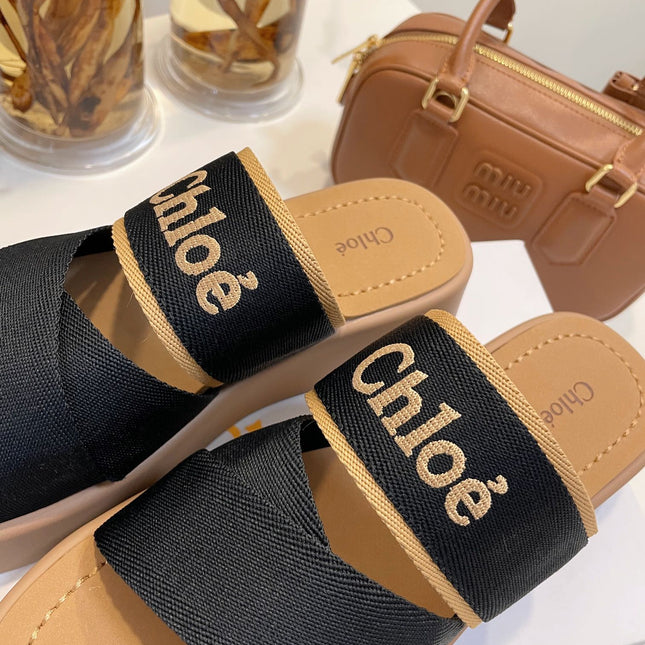 WOODY WEDGE SANDALS IN BLACK CANVAS WITH CIDER BROWN RUBBER SOLE