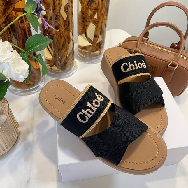 WOODY WEDGE SANDALS IN BLACK CANVAS WITH CIDER BROWN RUBBER SOLE