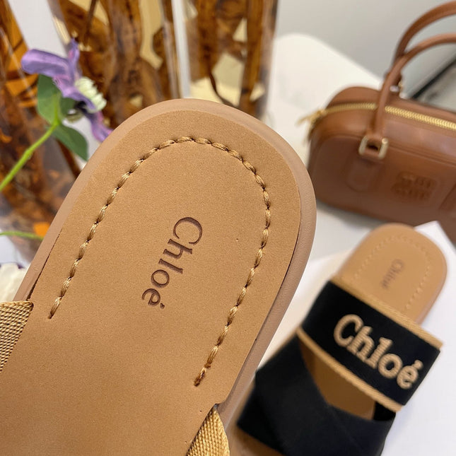 WOODY WEDGE SANDALS IN BLACK CANVAS WITH CIDER BROWN RUBBER SOLE