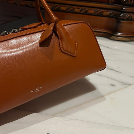 LE TECKEL MEDIUM BAG 33 IN BRONZE ORANGE GOATSKIN