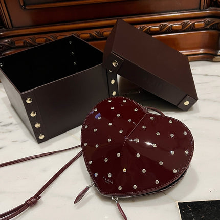LE COEUR BAG 21 IN BURGUNDY RED PATENT CALFSKIN ATTACHED STRASS