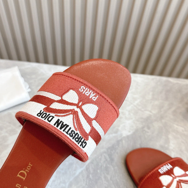 DIOR FLAT SLIDES 25S IN DARK ORANGE CALFSKIN AND FABRIC BRAND NAME EMBROIDERY
