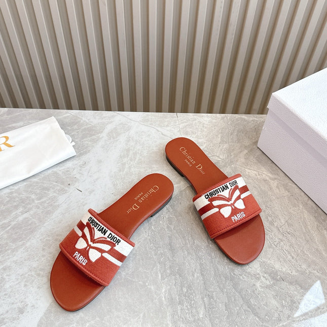 DIOR FLAT SLIDES 25S IN DARK ORANGE CALFSKIN AND FABRIC BRAND NAME EMBROIDERY