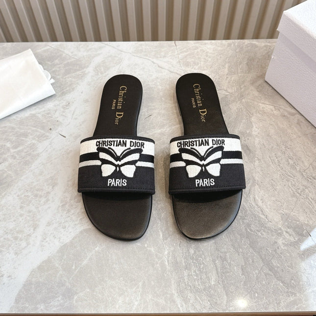 DIOR FLAT SLIDES 25S IN BLACK CALFSKIN AND FABRIC BRAND NAME EMBROIDERY