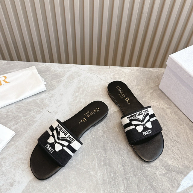 DIOR FLAT SLIDES 25S IN BLACK CALFSKIN AND FABRIC BRAND NAME EMBROIDERY
