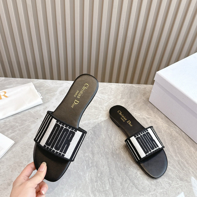 DIOR FLAT SLIDES 25S IN BLACK CALFSKIN AND FABRIC BRAND NAME EMBROIDERY