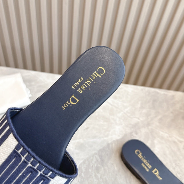 DIOR FLAT SLIDES 25S IN MIDNIGHT BLUE CALFSKIN AND FABRIC BRAND NAME EMBROIDERY