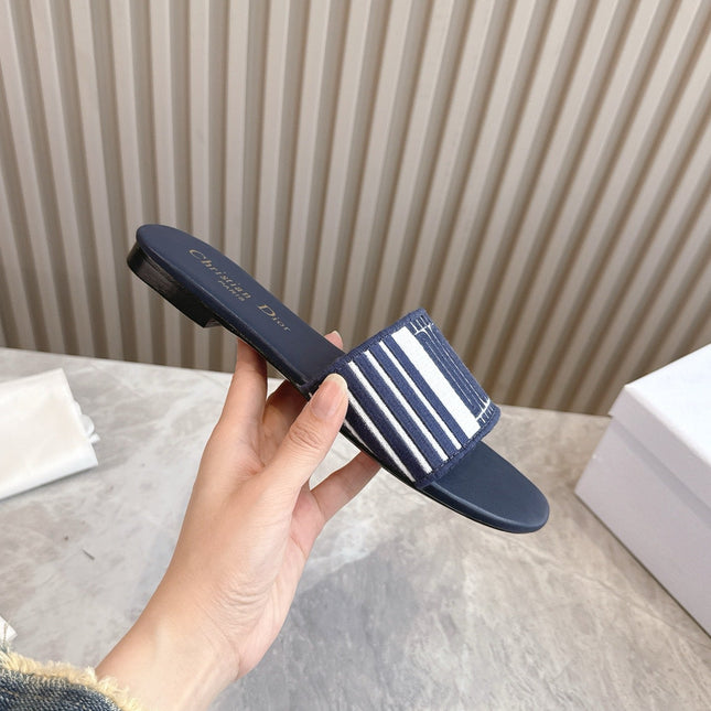 DIOR FLAT SLIDES 25S IN MIDNIGHT BLUE CALFSKIN AND FABRIC BRAND NAME EMBROIDERY