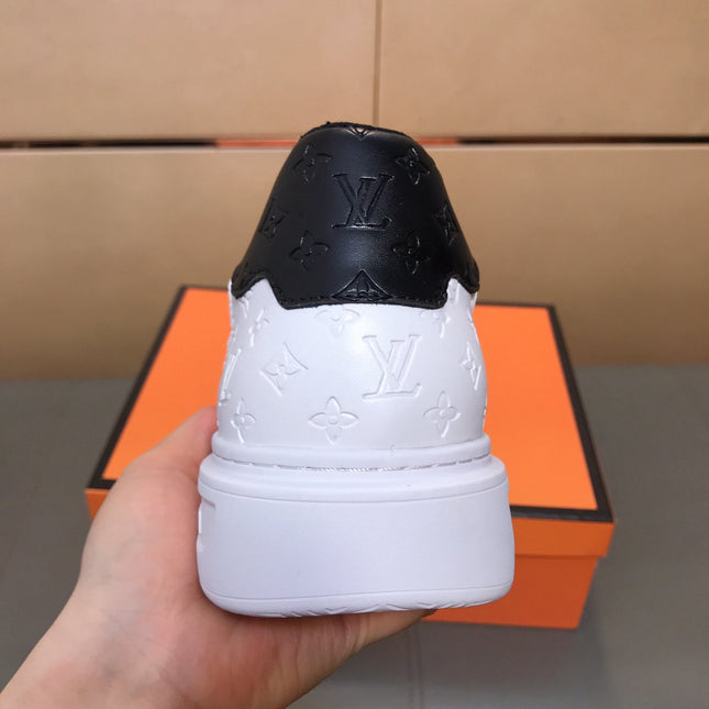 LV TRAINER SHOES IN WHITE AND BLACK CALFSKIN