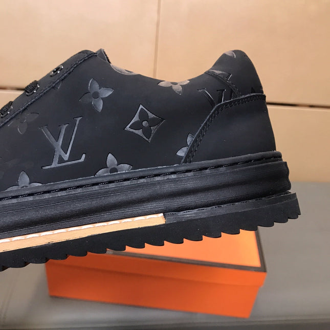 LV TRAINER IN EMBOSSED BLACK SUEDE