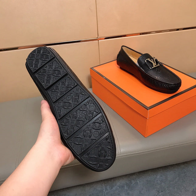 LV LOAFERS IN BLACK CALFSKIN WITH BRANDED EMBOSSING