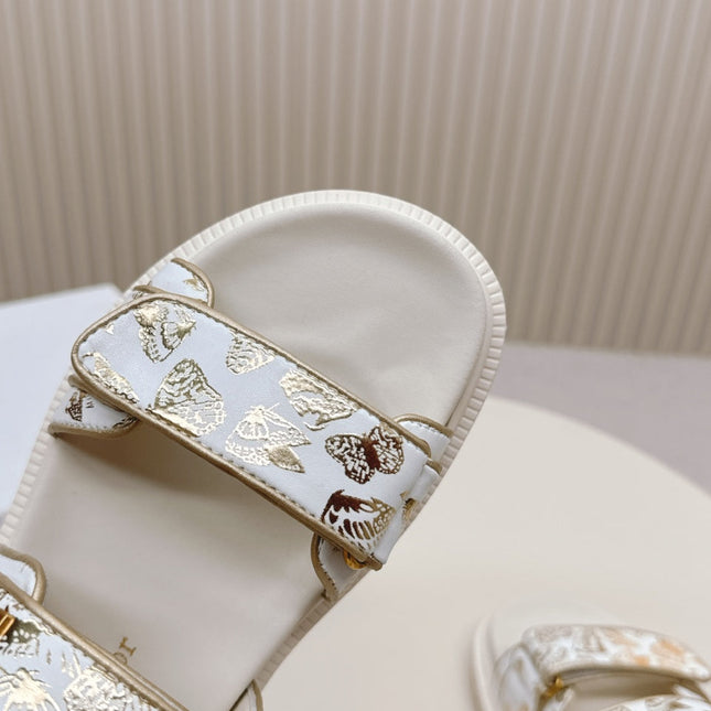 DIOR BACK-STRAP SANDALS 25S IN CREAM WHITE AND GOLD CALFSKIN WITH BUTTERFLY MOTIF