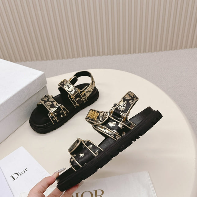 DIOR BACK-STRAP SANDALS 25S IN BLACK AND GOLD CALFSKIN WITH BUTTERFLY MOTIF