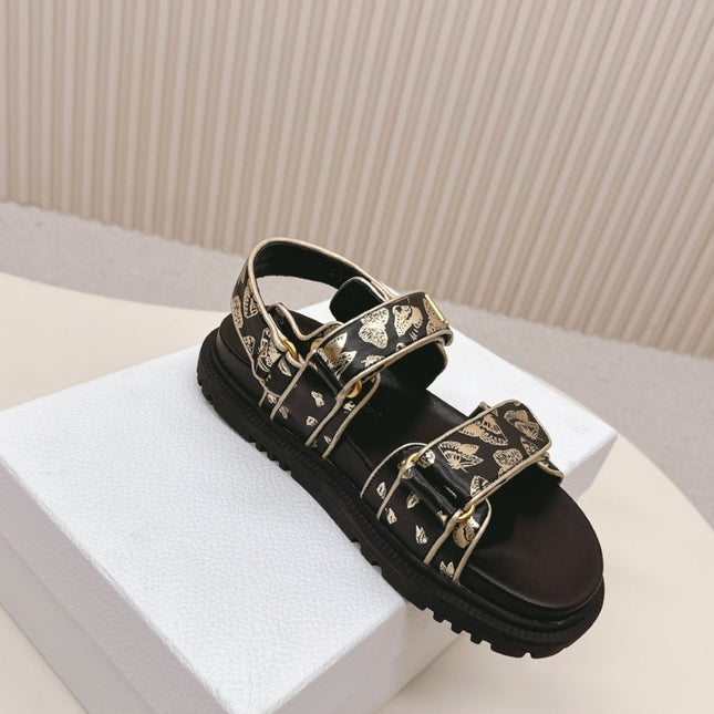 DIOR BACK-STRAP SANDALS 25S IN BLACK AND GOLD CALFSKIN WITH BUTTERFLY MOTIF