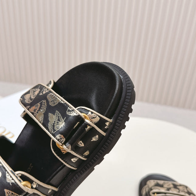 DIOR BACK-STRAP SANDALS 25S IN BLACK AND GOLD CALFSKIN WITH BUTTERFLY MOTIF