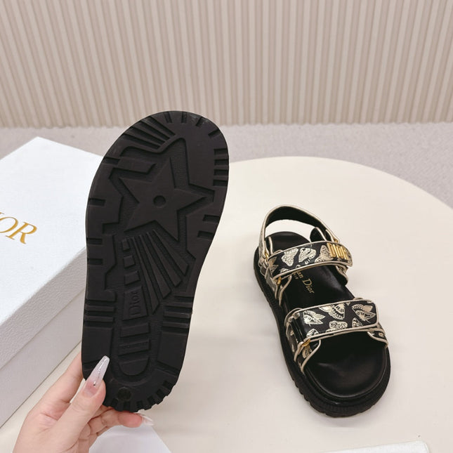 DIOR BACK-STRAP SANDALS 25S IN BLACK AND GOLD CALFSKIN WITH BUTTERFLY MOTIF