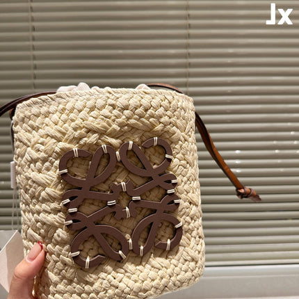 LOE ANAGRAM MINI 18 BUCKET BAG IN NATURAL RAFFIA