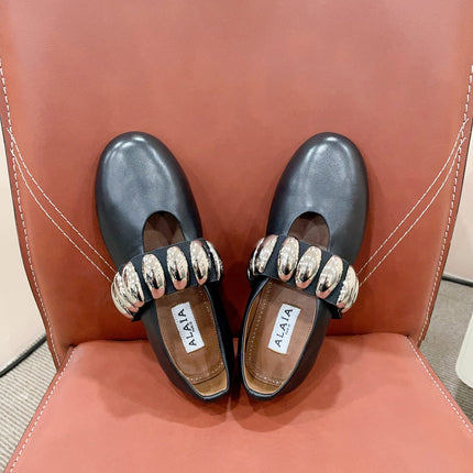 ALAIA TRIBALE BALLET FLATS IN BLACK LAMBSKIN