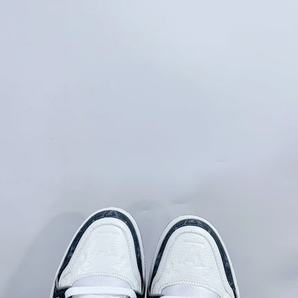 LV TRAINER SNEAKER IN WHITE CALFSKIN AND BLACK MONOGRAM DENIM