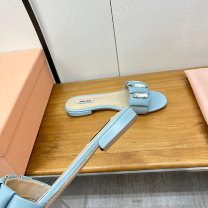 FLAT SLIDE IN LIGHT BLUE CALFSKIN