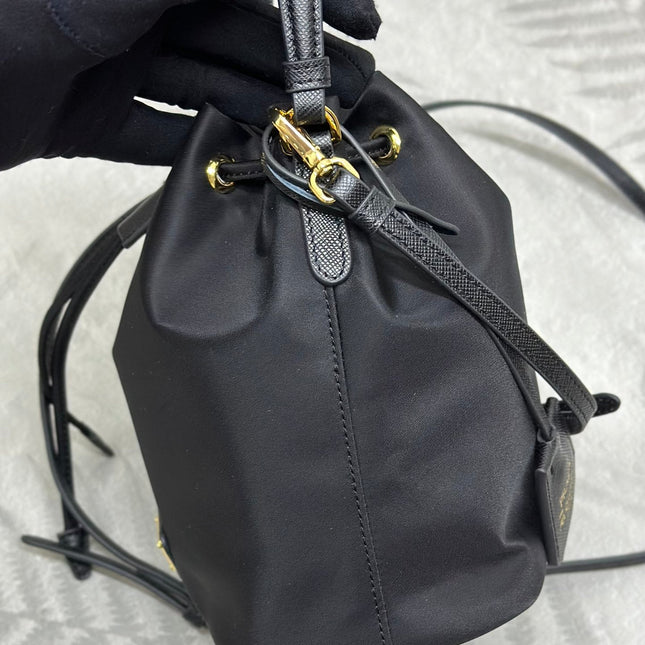 BUCKET BAG 19 IN BLACK RE-NYLON AND CALFSKIN HANDLE