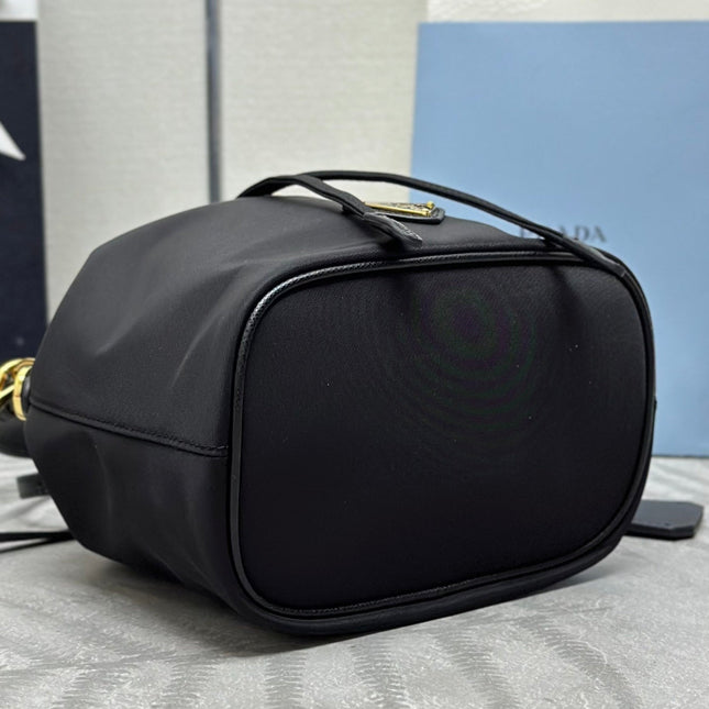 BUCKET BAG 19 IN BLACK RE-NYLON AND CALFSKIN HANDLE
