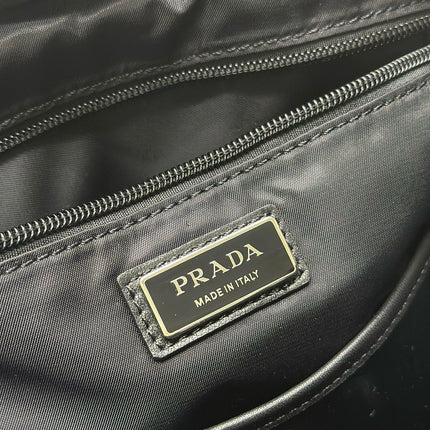 PRADA 25S BACKPACK 39 IN BLACK RE-NYLON AND SAFFIANO CALFSKIN