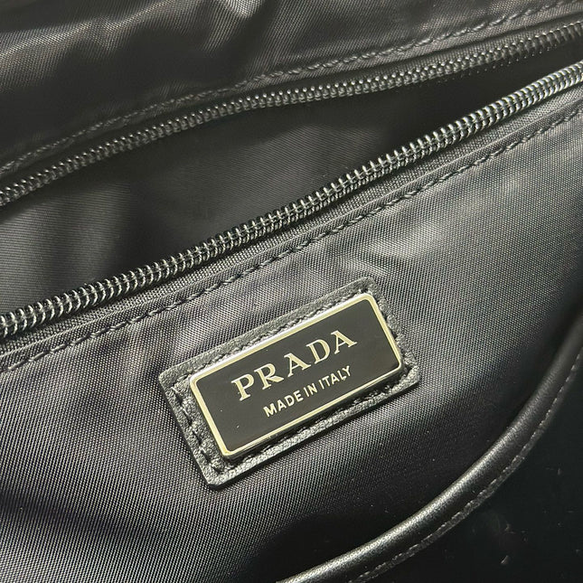 PRADA 25S BACKPACK 39 IN BLACK RE-NYLON AND SAFFIANO CALFSKIN
