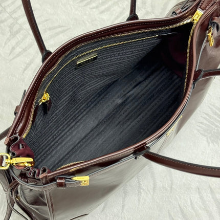 PRADA 25S BONNIE EXTRA-LARGE 42 IN DARK BROWN GLOSSY CALFSKIN GOLD HARDWRE