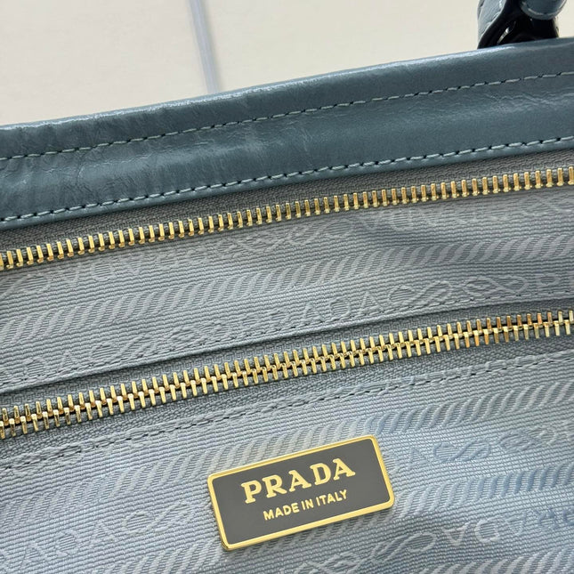 PRADA 25S LUX SOFT BAG 42 IN BLUE GLOSSY CALFSKIN GOLD HARDWRE