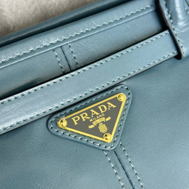 PRADA 25S LUX SOFT BAG 42 IN BLUE GLOSSY CALFSKIN GOLD HARDWRE