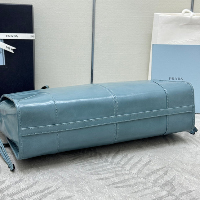 PRADA 25S LUX SOFT BAG 42 IN BLUE GLOSSY CALFSKIN GOLD HARDWRE