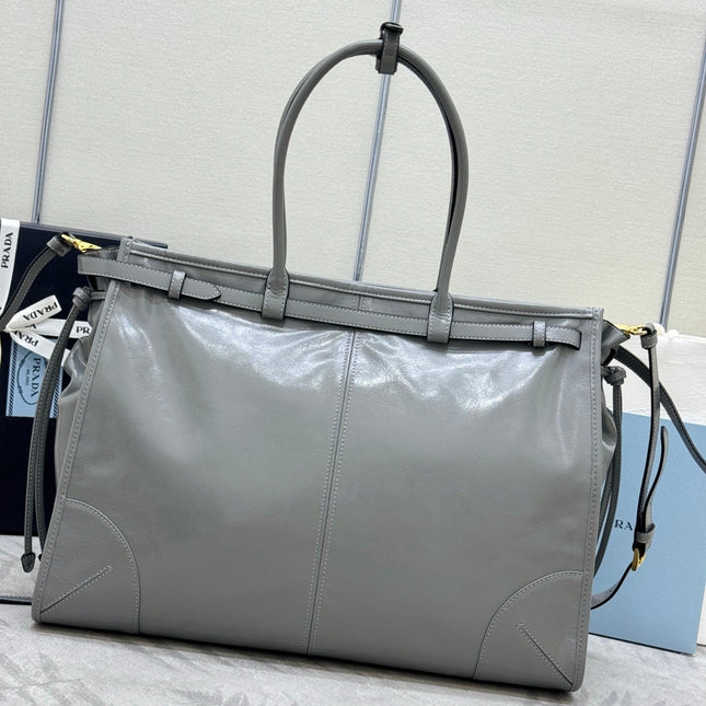 PRADA 25S LUX SOFT BAG 42 IN GRAY GLOSSY CALFSKIN GOLD HARDWRE