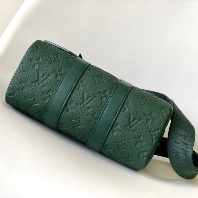 KEEPALL BANDOULIÈRE 25 IN FOREST GREEN MONOGRAM EMBOSSED CALFSKIN