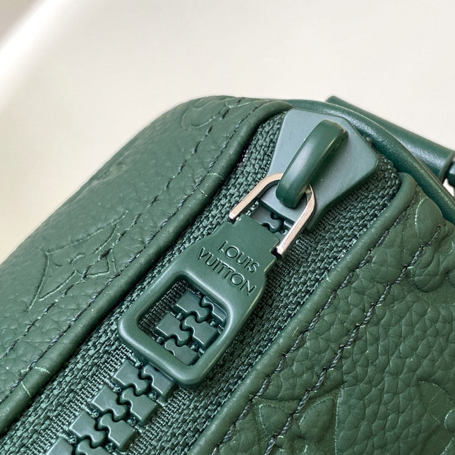 KEEPALL BANDOULIÈRE 25 IN FOREST GREEN MONOGRAM EMBOSSED CALFSKIN