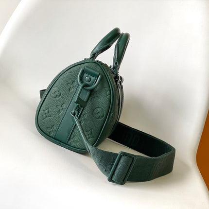 KEEPALL BANDOULIÈRE 25 IN FOREST GREEN MONOGRAM EMBOSSED CALFSKIN