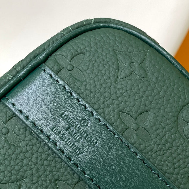 KEEPALL BANDOULIÈRE 25 IN FOREST GREEN MONOGRAM EMBOSSED CALFSKIN