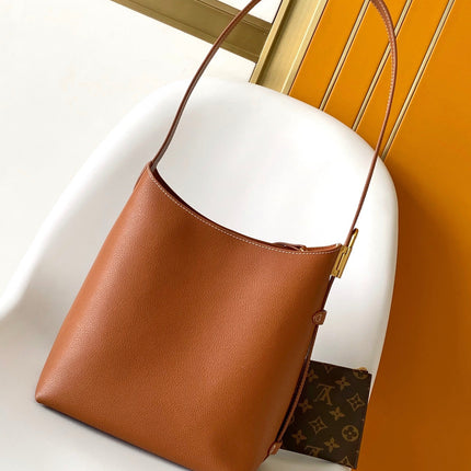 LV 25S LOW KEY HOBO BAG 35 CM IN BURNT ORANGE CALFSKIN