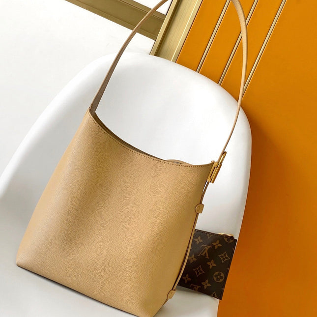 LV 25S LOW KEY HOBO BAG 28 CM IN BEIGE CALFSKIN
