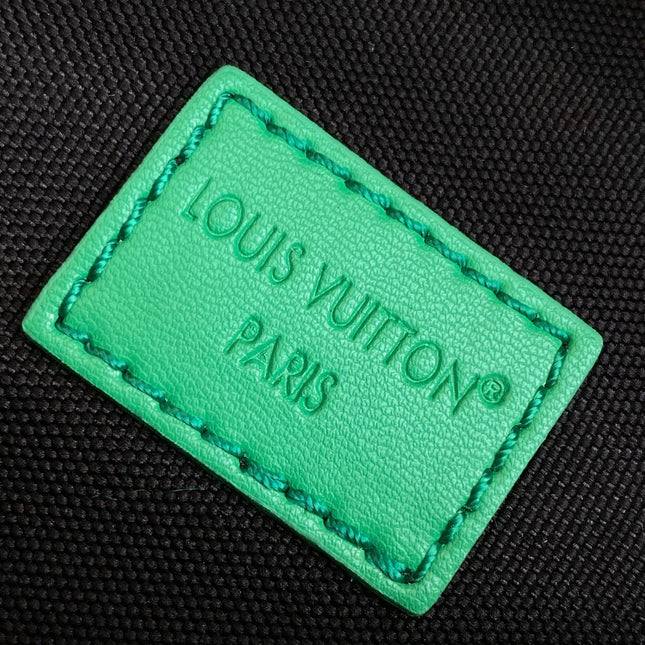 LV 25S DISCOVERY BUMBAG 44 IN BLACK NEON JADE MONOGRAM ECLIPSE CANVAS AND CALFSKIN