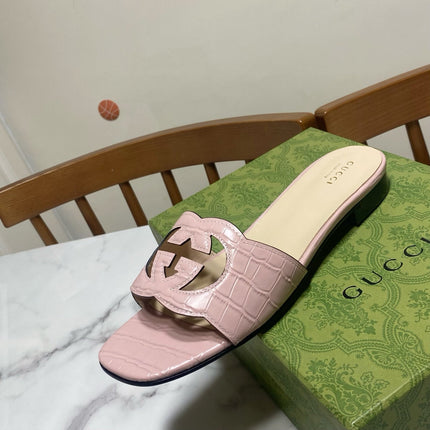 GG SLIDES IN PASTEL PINK CALFSKIN LOGO-EMBOSSED STRAP