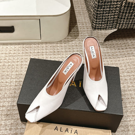 ALAIA SPIKE JEWEL MULES IN WHITE CALFSKIN