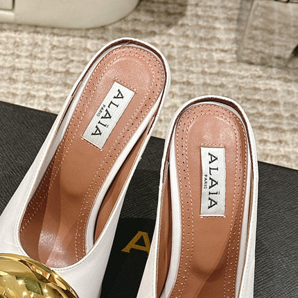 ALAIA SPIKE JEWEL MULES IN WHITE CALFSKIN WITH GOLD HARDWARE