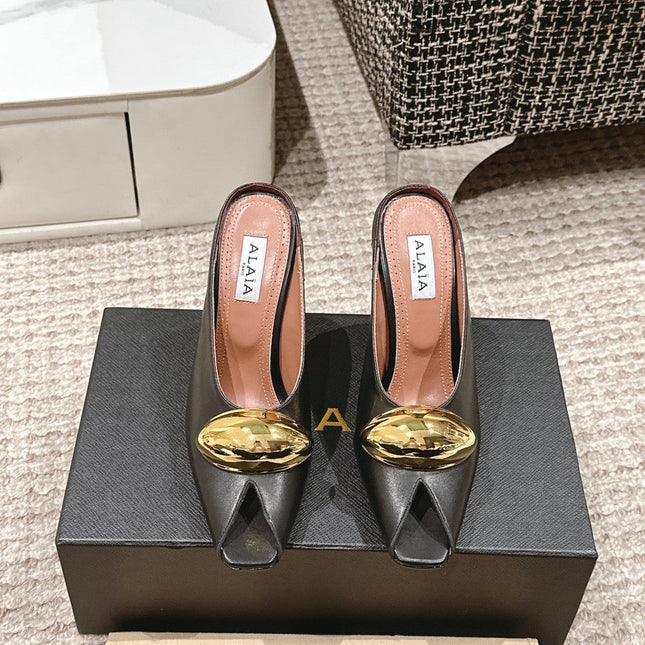 ALAIA SPIKE JEWEL MULES IN BLACK CALFSKIN WITH GOLD HARDWARE