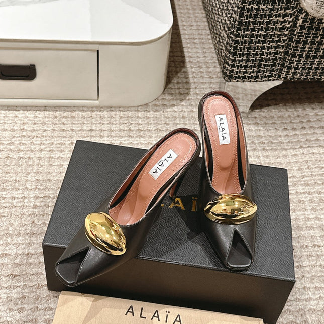 ALAIA SPIKE JEWEL MULES IN BLACK CALFSKIN WITH GOLD HARDWARE