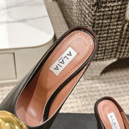 ALAIA SPIKE JEWEL MULES IN BLACK CALFSKIN WITH GOLD HARDWARE